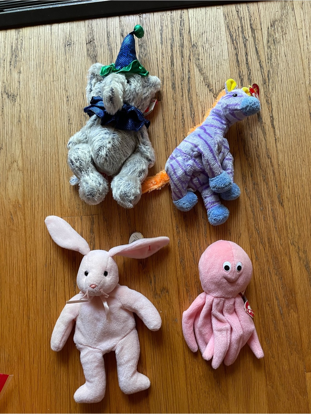 Mixed lot of 4 TY beanie Babies: hoppity, Vegas, inky, emmet